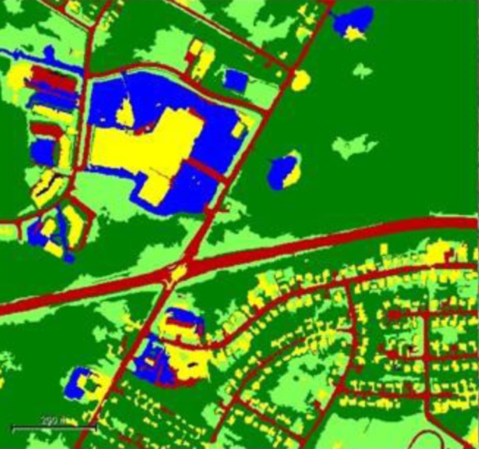 Color-coded GIS map showing annotated roads, buildings, water, and vegetation areas used for AI training and planting zone detection
