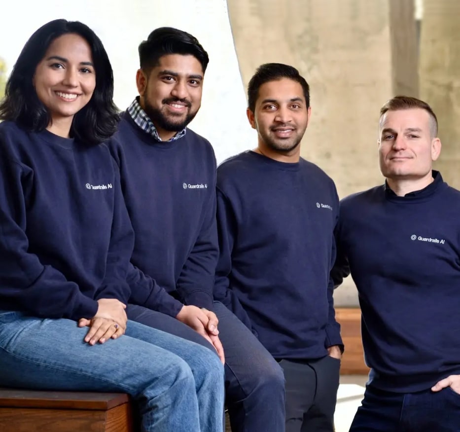 Group photo of the Guardrails AI team wearing branded sweatshirts, representing the company’s focus on AI safety and compliance solutions