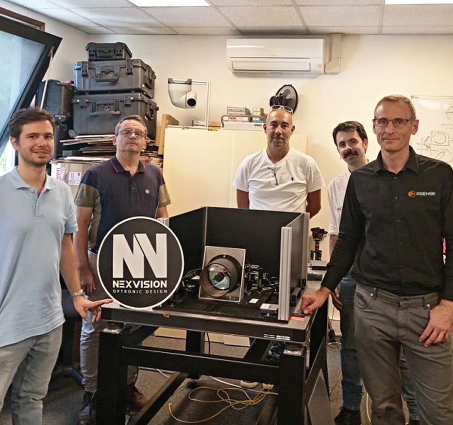 Nexvision engineering team with embedded vision system equipment for defense and industrial applications