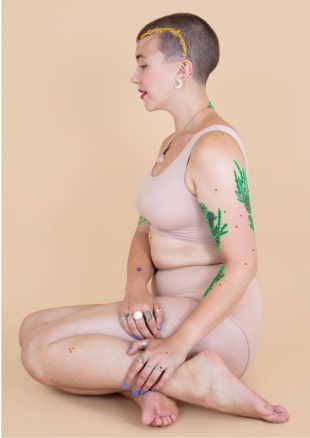 Woman sitting with annotated skin areas for data labeling project